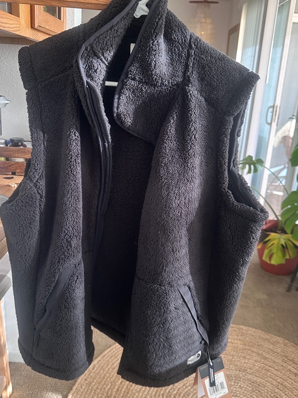 The North Face Black and Brown Price Tag Detail